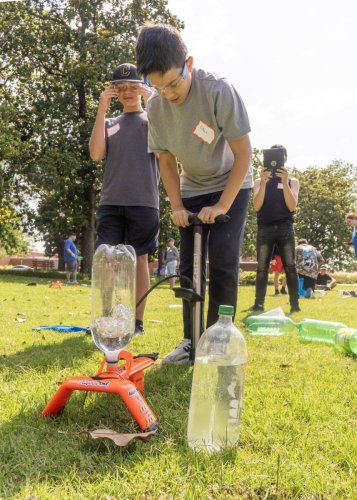 Students setting up a device