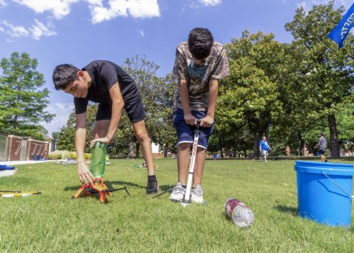 Students setting up a device