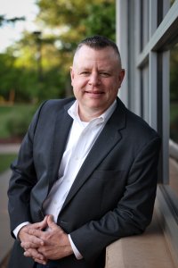 Greg Kent is a retired Lt Col headshot