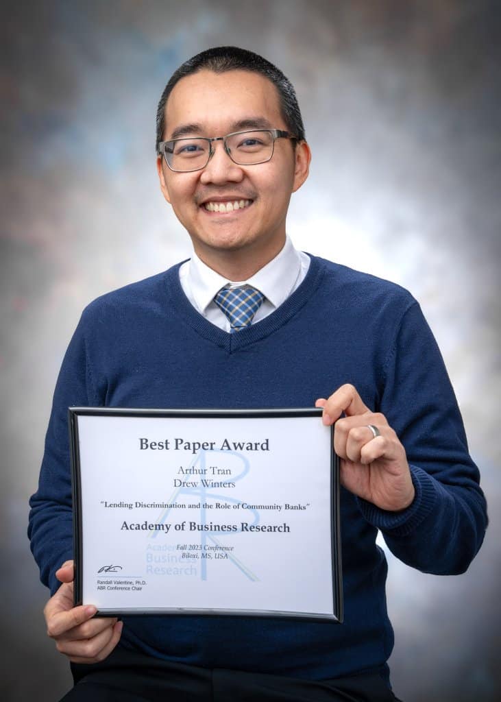 Dr. Arthur Tran with his ABR conference award
