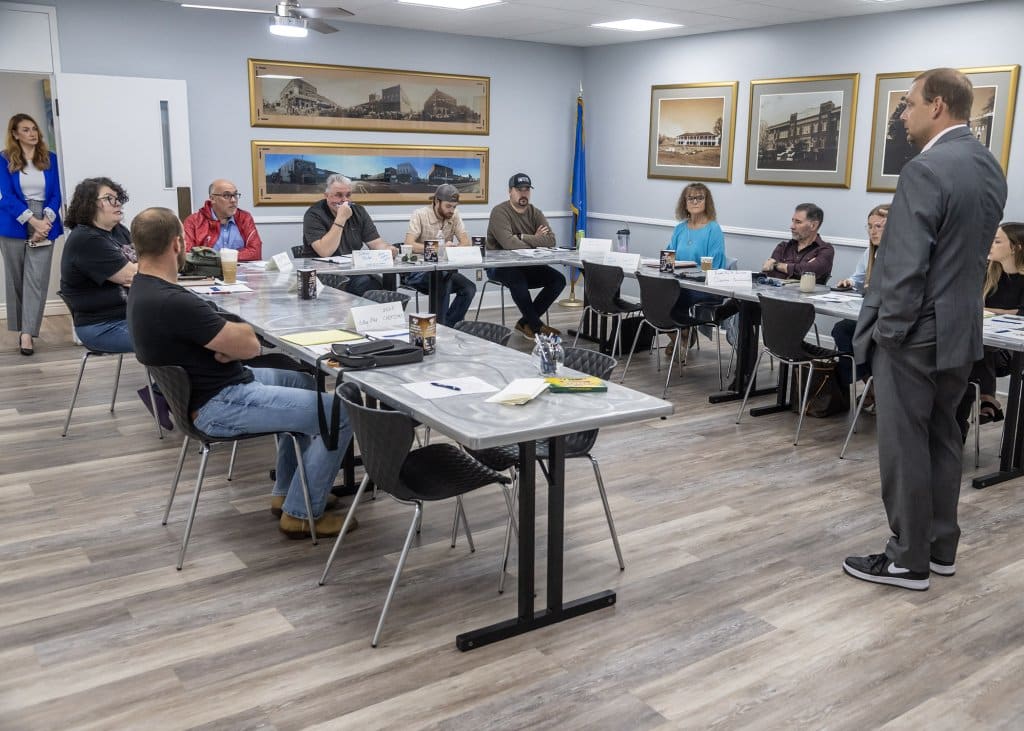 Dr. Eric Kennedy speaking in a classroom setting at the Durant Area Chamber of Commerce