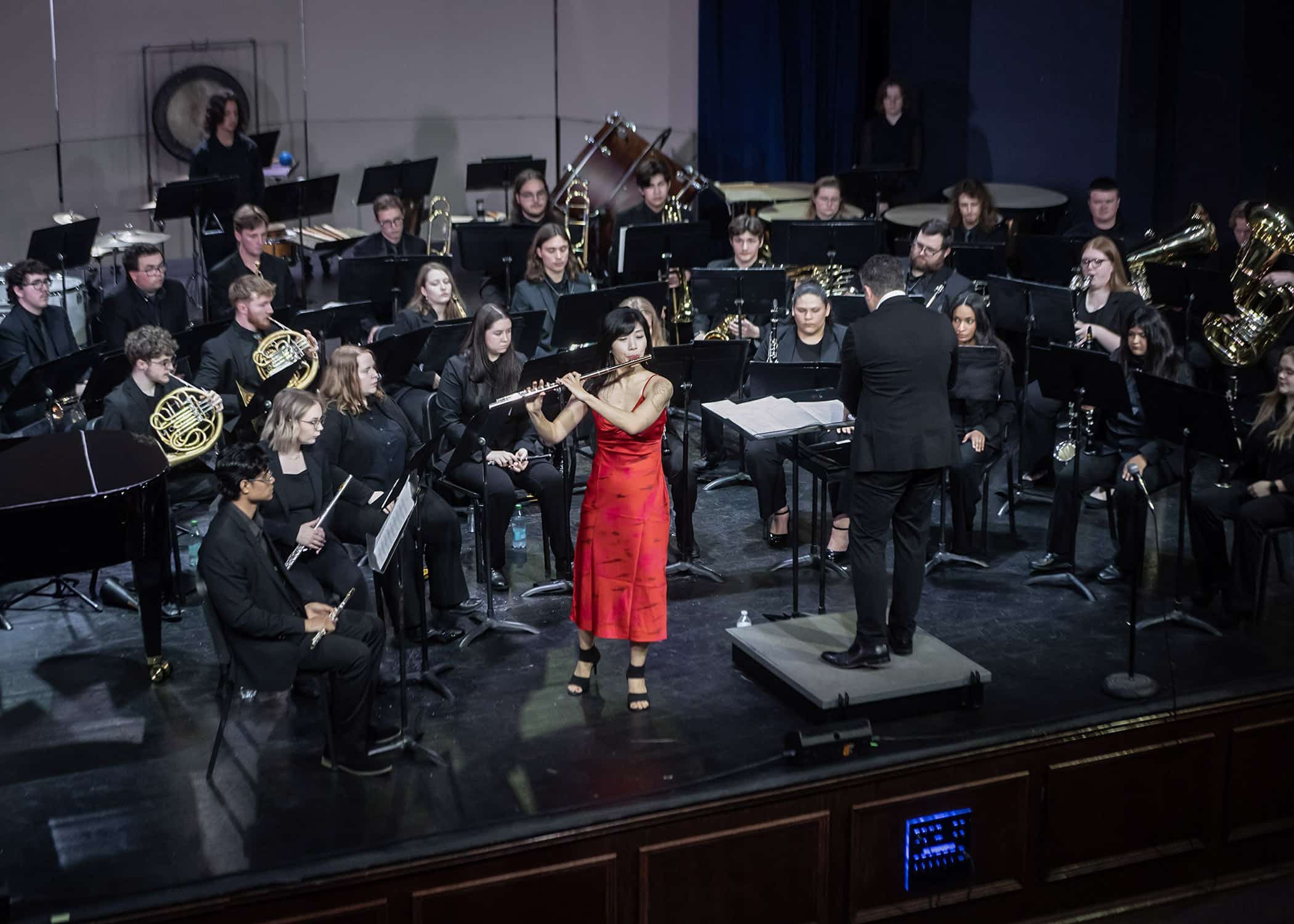 The spring 2025 Southeastern Symphonic Winds Ensemble performs on stage