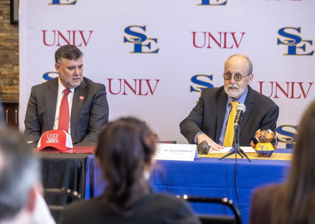Dr David Whitlock speaking at a press event