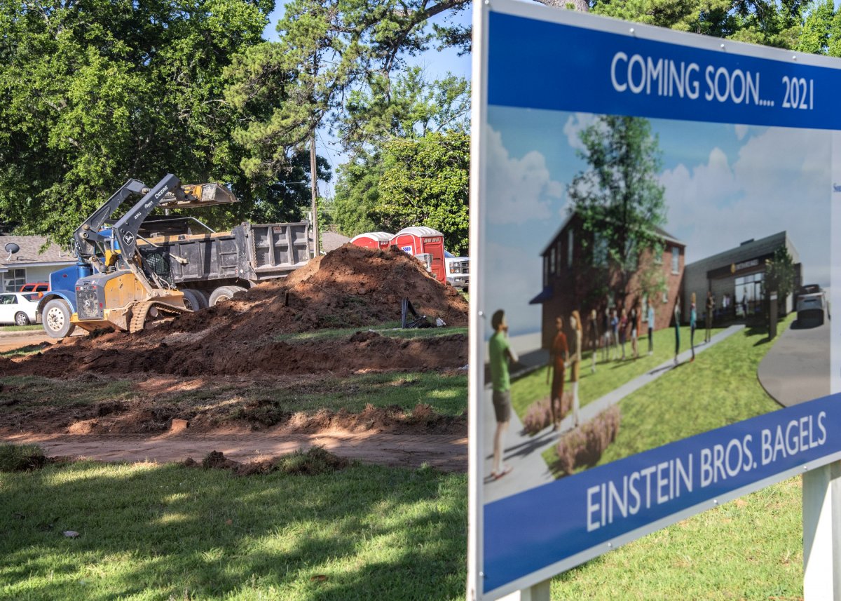 Preliminary construction work starts on Einstein Bros. Bagels near campus banner