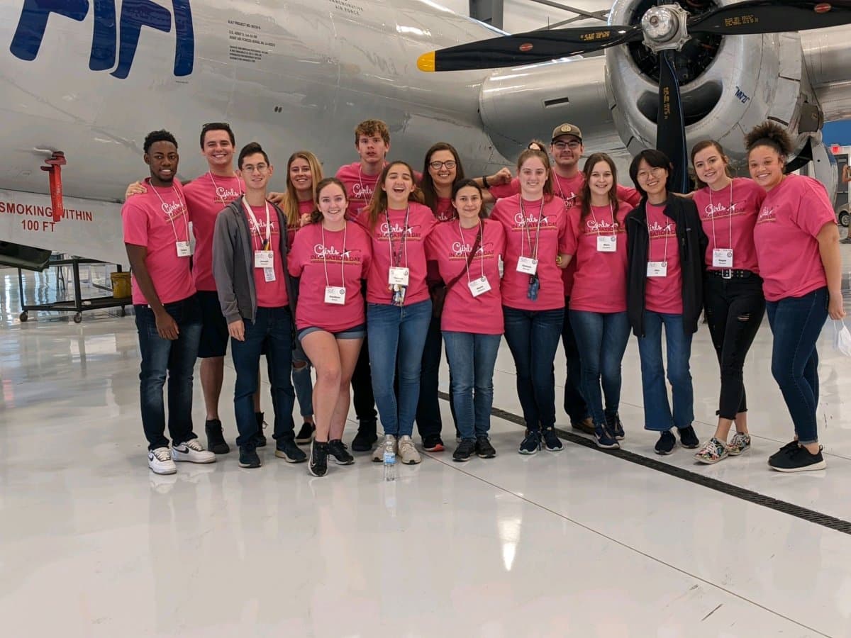 Southeastern Women In Aviation volunteer at Dallas event banner