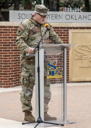 Military personnel in camouflage uniforms